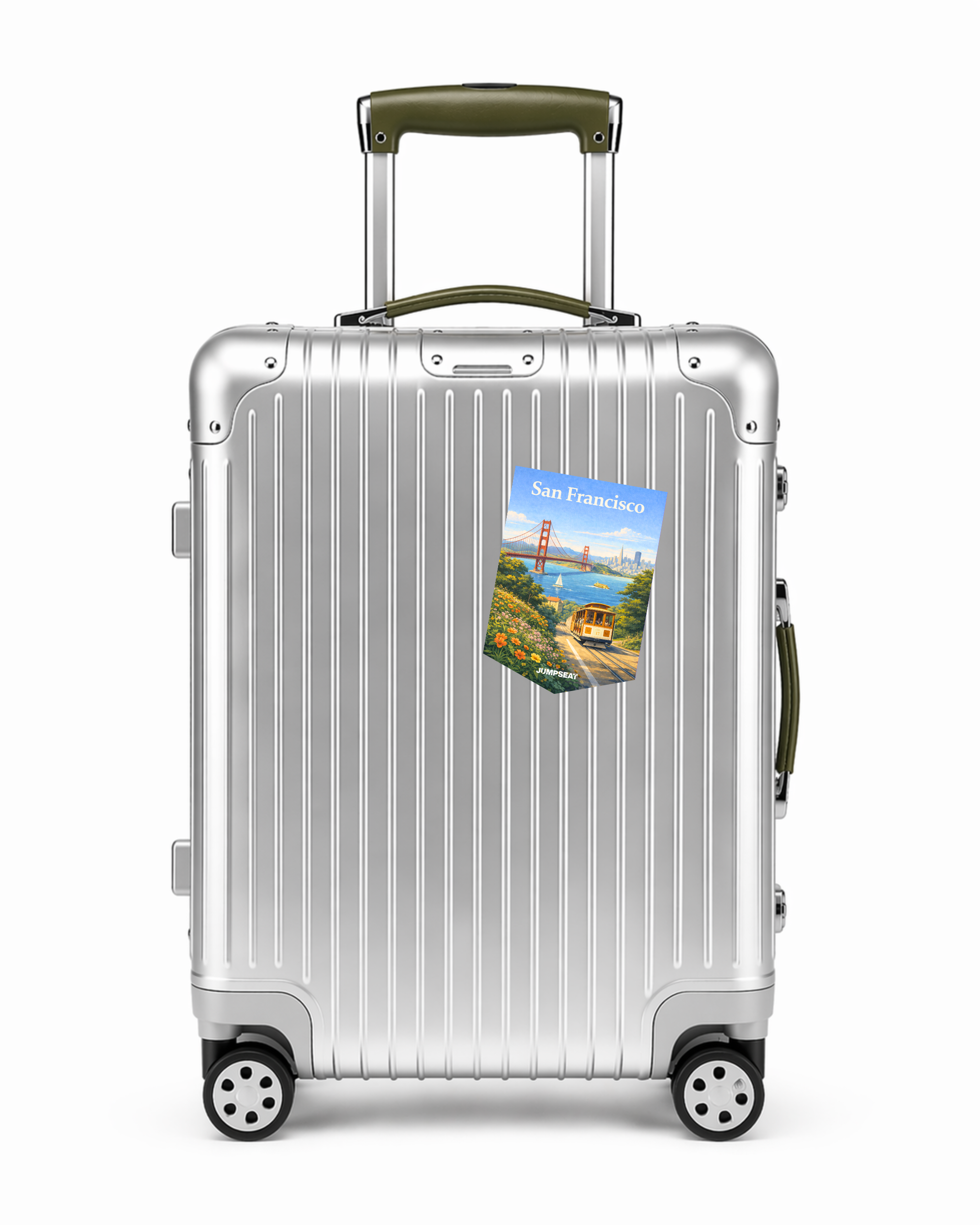 Silberner Reisekoffer mit San Francisco Reise-Sticker und grünem Griff