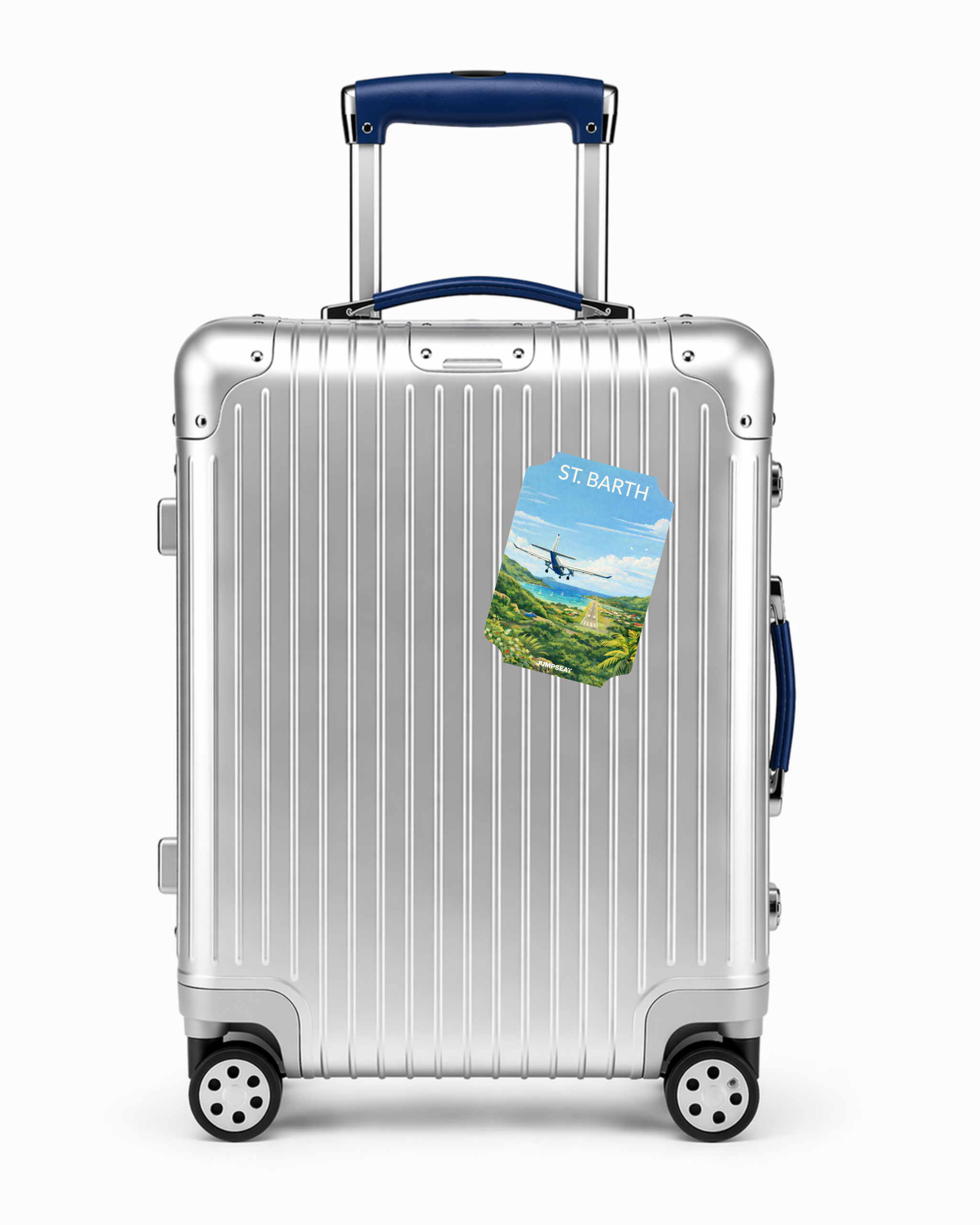 Silberner Reisekoffer mit St. Barth Reise-Sticker und blauem Griff